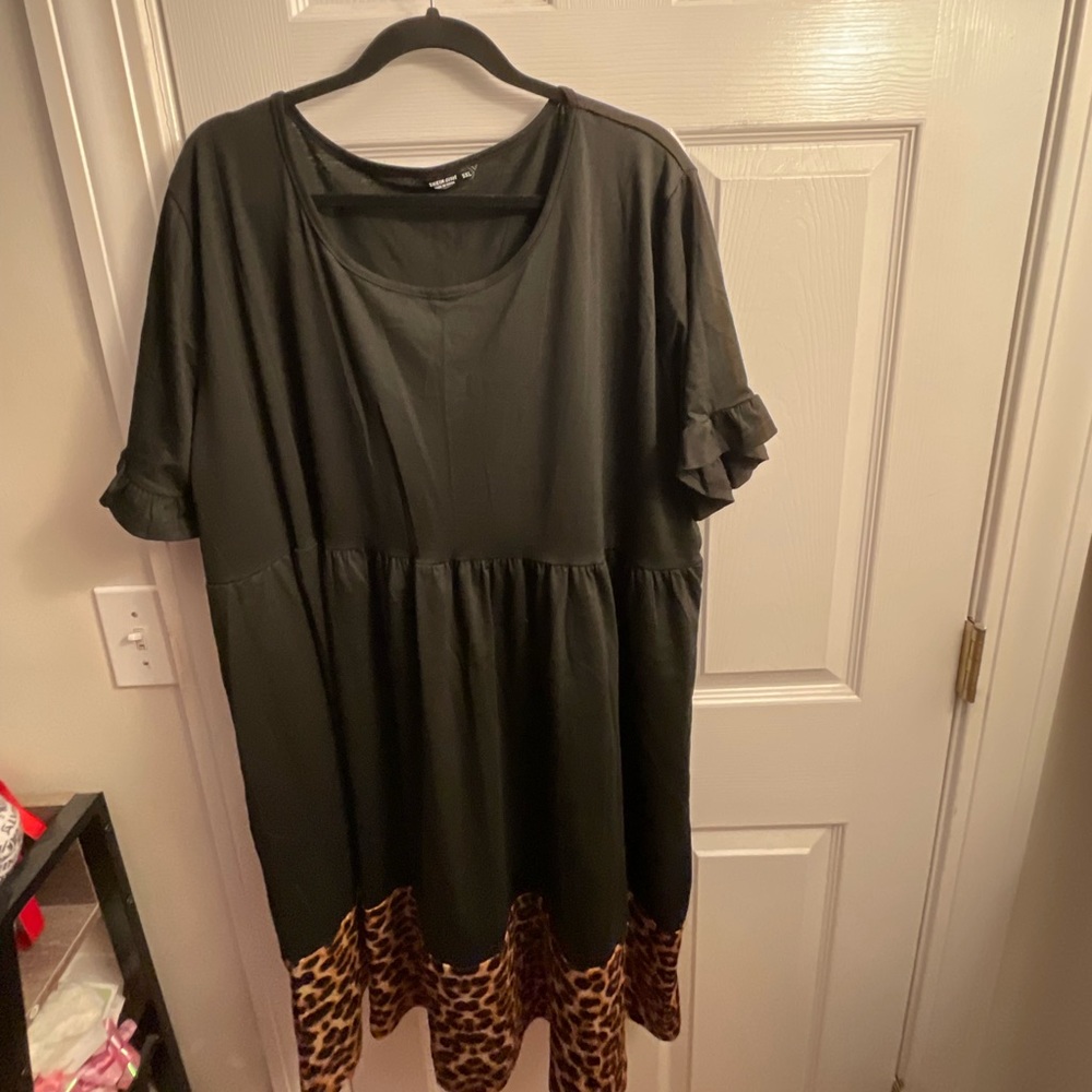 Black dress with leopard print on the bottom